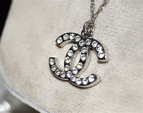 fake chanel symbol necklace|how to authenticate chanel earrings.